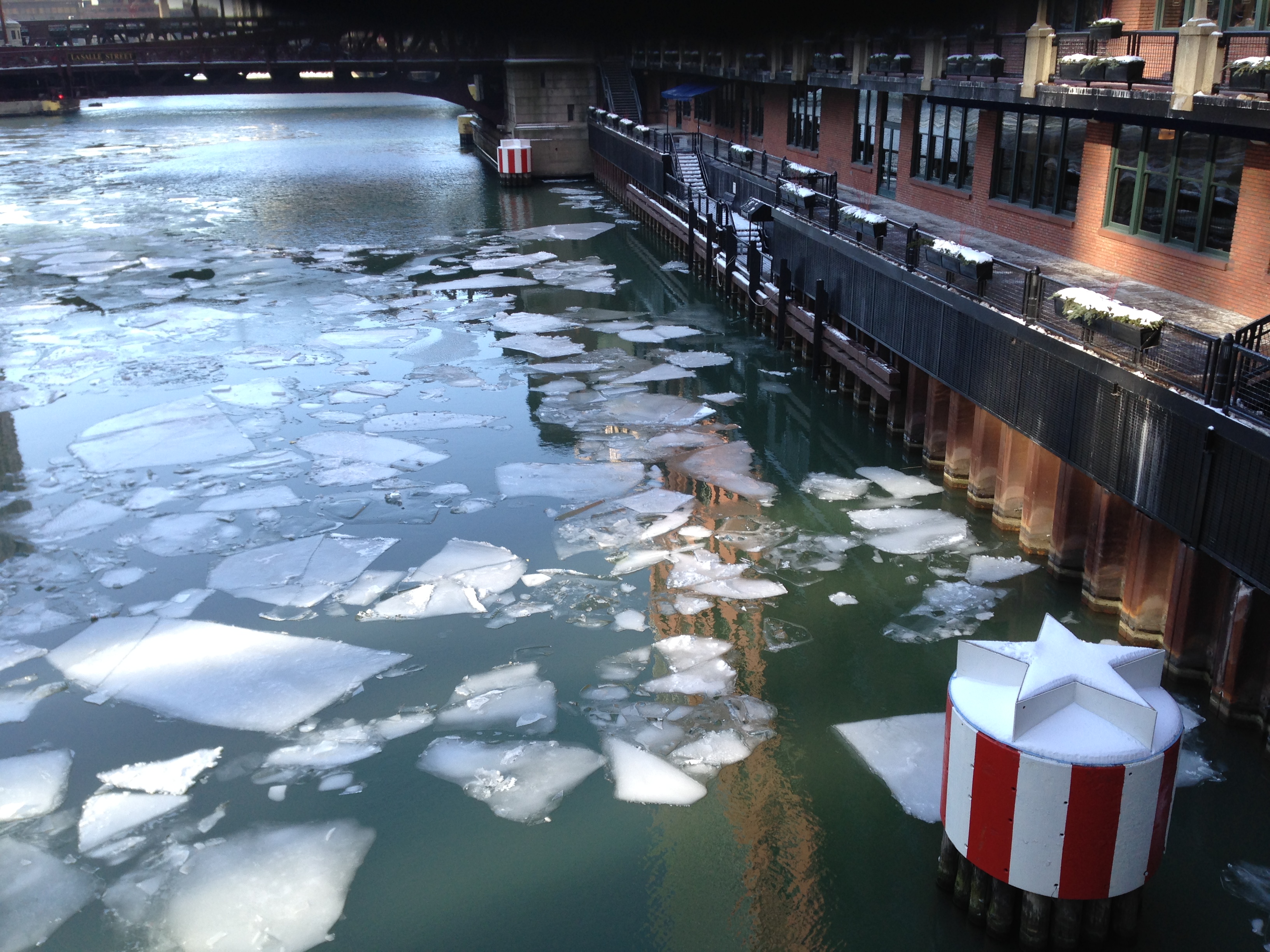 Walking in the cold... that's ice, ice, baby on the Chicago River